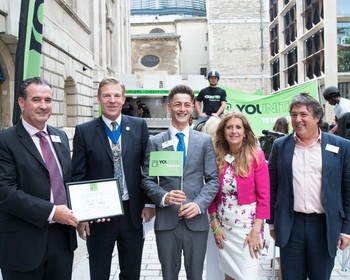 Liam Mereditth (centre) receiving the Younited Flag award with Key4Life founder Eva Hamilton & the Lord Mayor of London