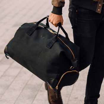 Weekender Leather-Trimmed Cotton-Canvas Holdall, £750 | BENNETT WINCH