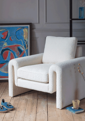 Lexi Ivory Bouclé Curved Armchair from Graham & Green